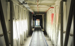 Convoyeurs automatiques dans l'entrepôt de Grup Baucells Alimentació Convoyeurs automatiques dans l'entrepôt de Grup Baucells Alimentació